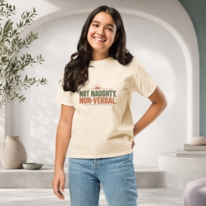 Not Naughty. Non Verbal. Natural tshirt modelled by a young girl in blue jeans